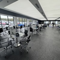 Aura executive medium back with 900mm diamter tops and brushed steel base
